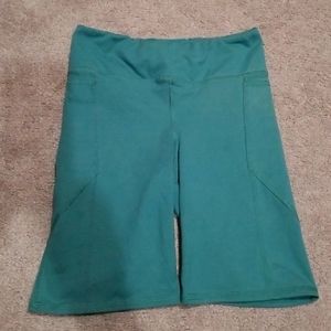 Small teal Urban Outfitters work out shorts.